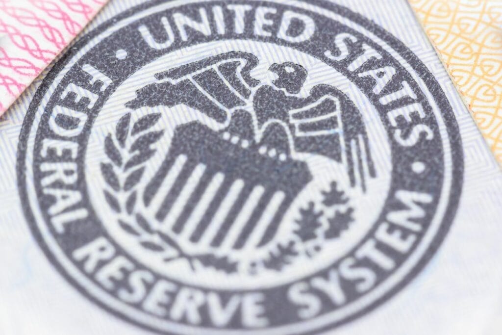 Picture of the federal reserve logo to represent the implication of rising interest rates
